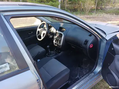 Mitsubishi Carisma 1,6 Comfort Sedan, ilmoituksen kuva
